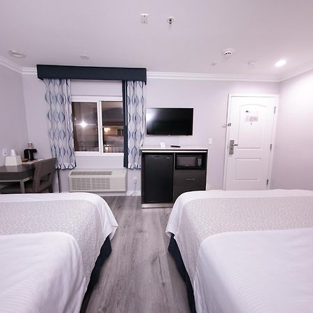 Travelodge Inn & Suites By Wyndham Уэст-Ковина Номер фото